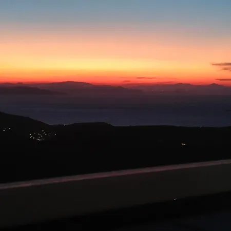 Enjoy A Wondeful Sunset From A Traditional House-aggelos *